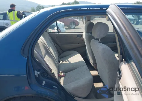 1998 Toyota Corolla Le from USA, damaged, VIN 2T1BR18E4WC007794